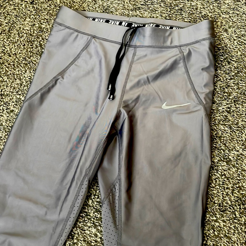 Nike Running Leggings. Silver/grey. Never worn. NWOT